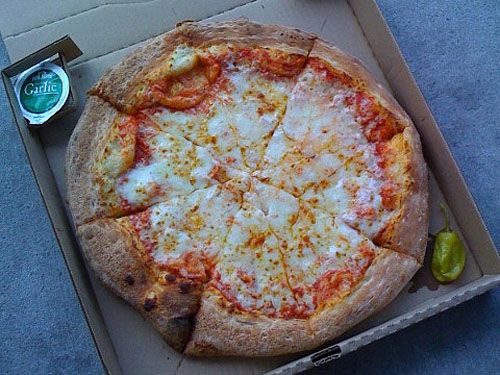 A Papa John's cheese pizza in a box.