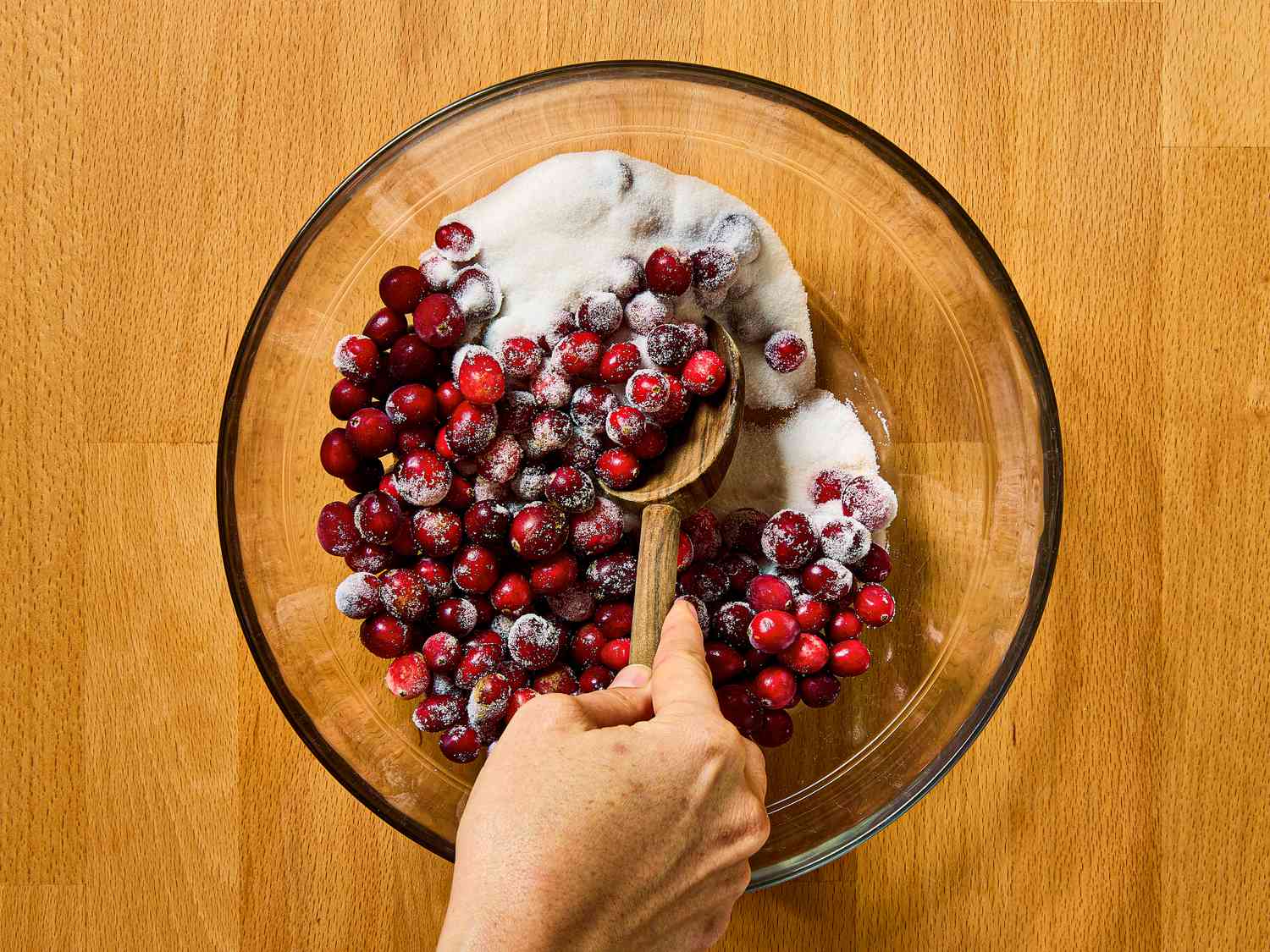 Overhead view of mixing cranberries 
