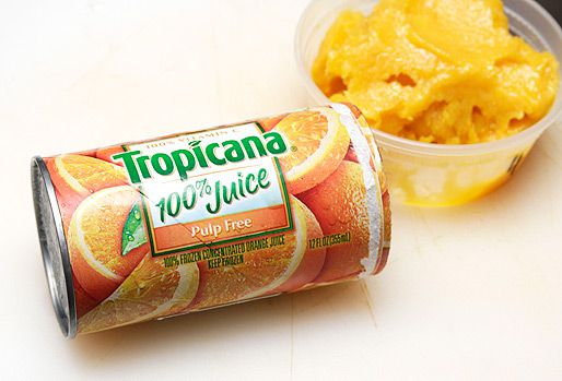 A container of frozen orange juice concentrate.