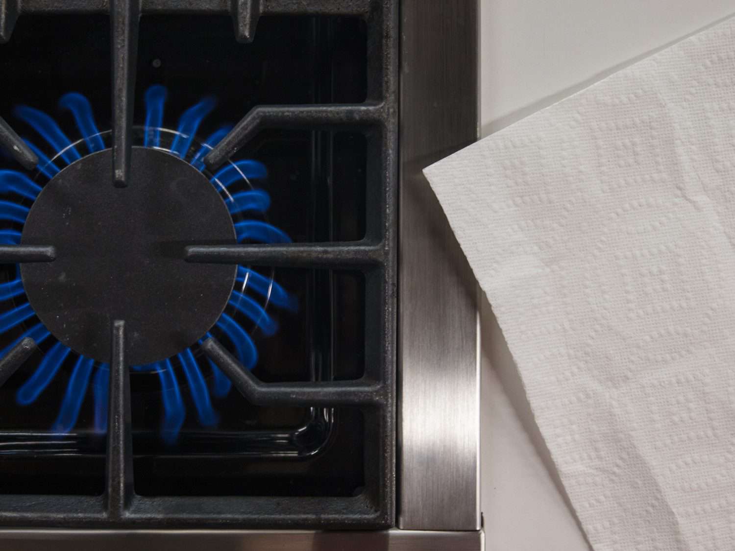 A paper towel that's too close to a kitchen burner flame: dangerous