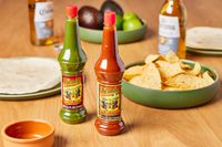Picamas Hot Sauce next to bowl of chips
