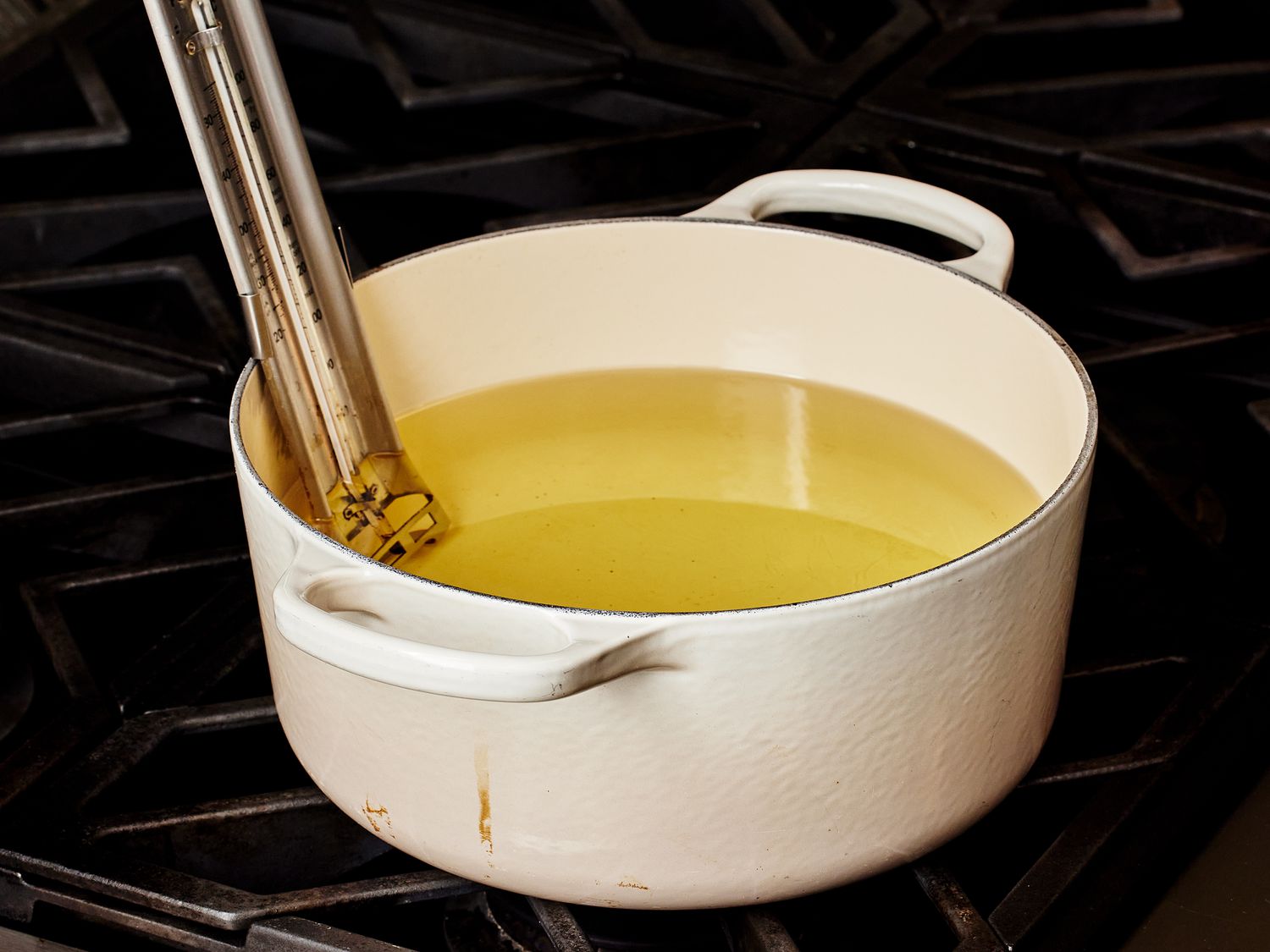 Dutch oven filled with oil 