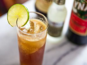 An Italian Buck cocktail garnished with a slice of lime