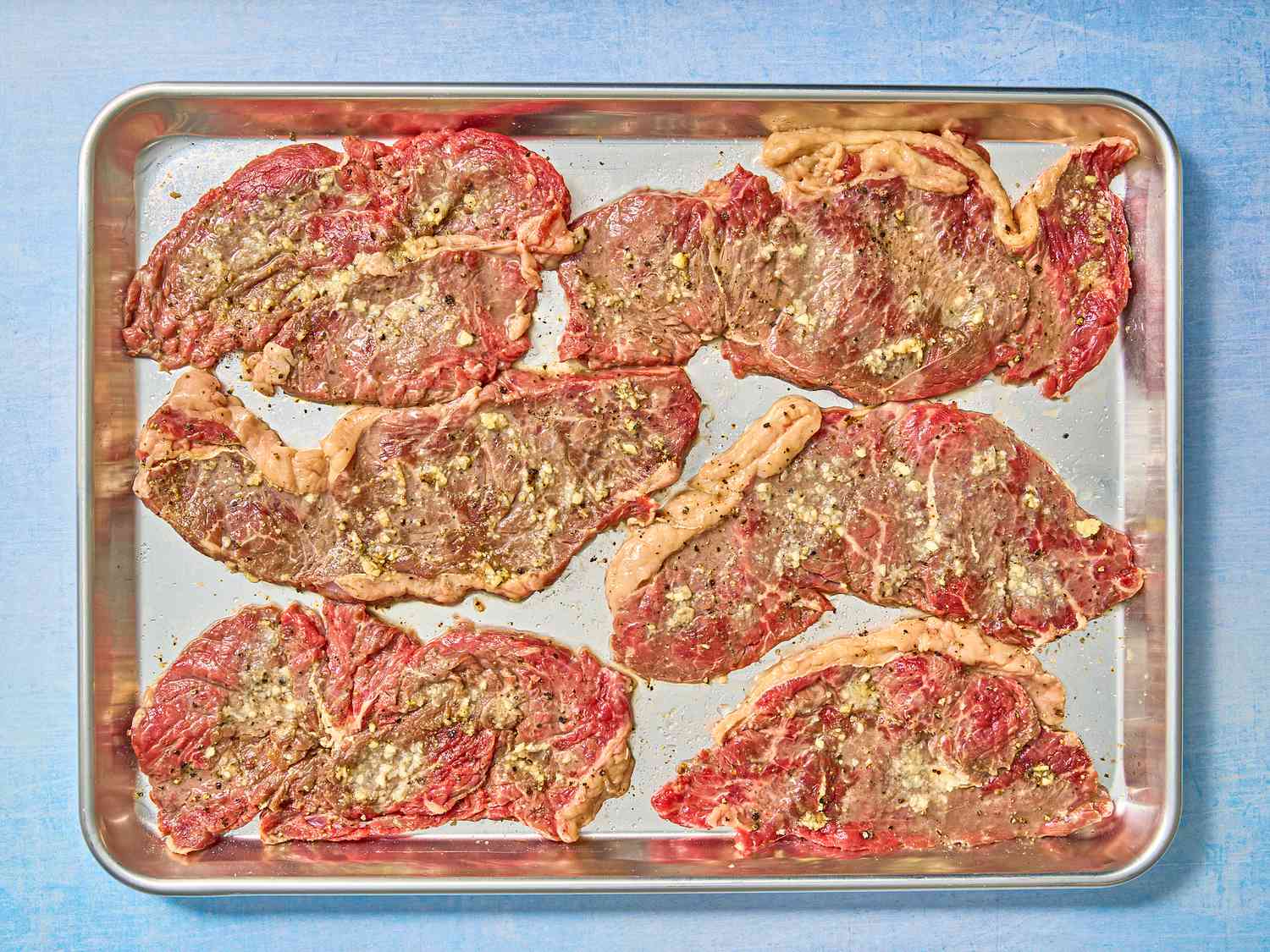 Seasoned steaked after marinating for at least 30 minutes 