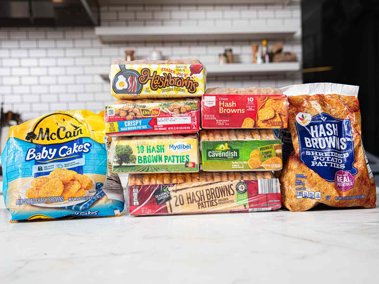 A variety of packaged hash brown products arranged on a table