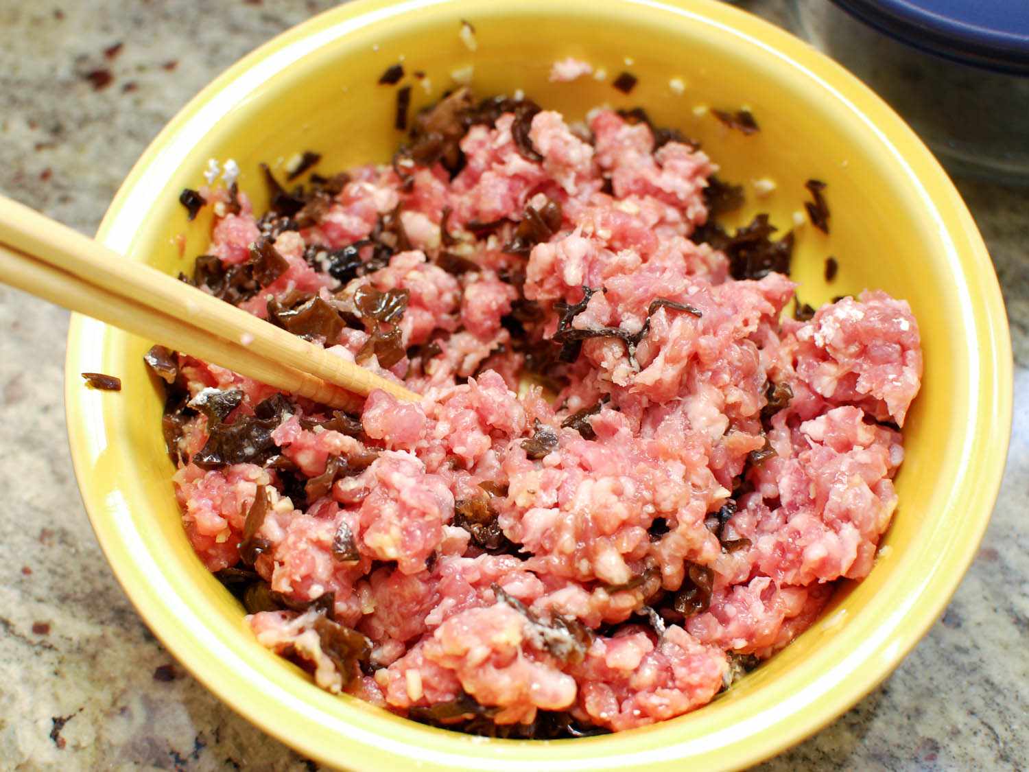 Close-up of a prep bowl containing the pork filling.