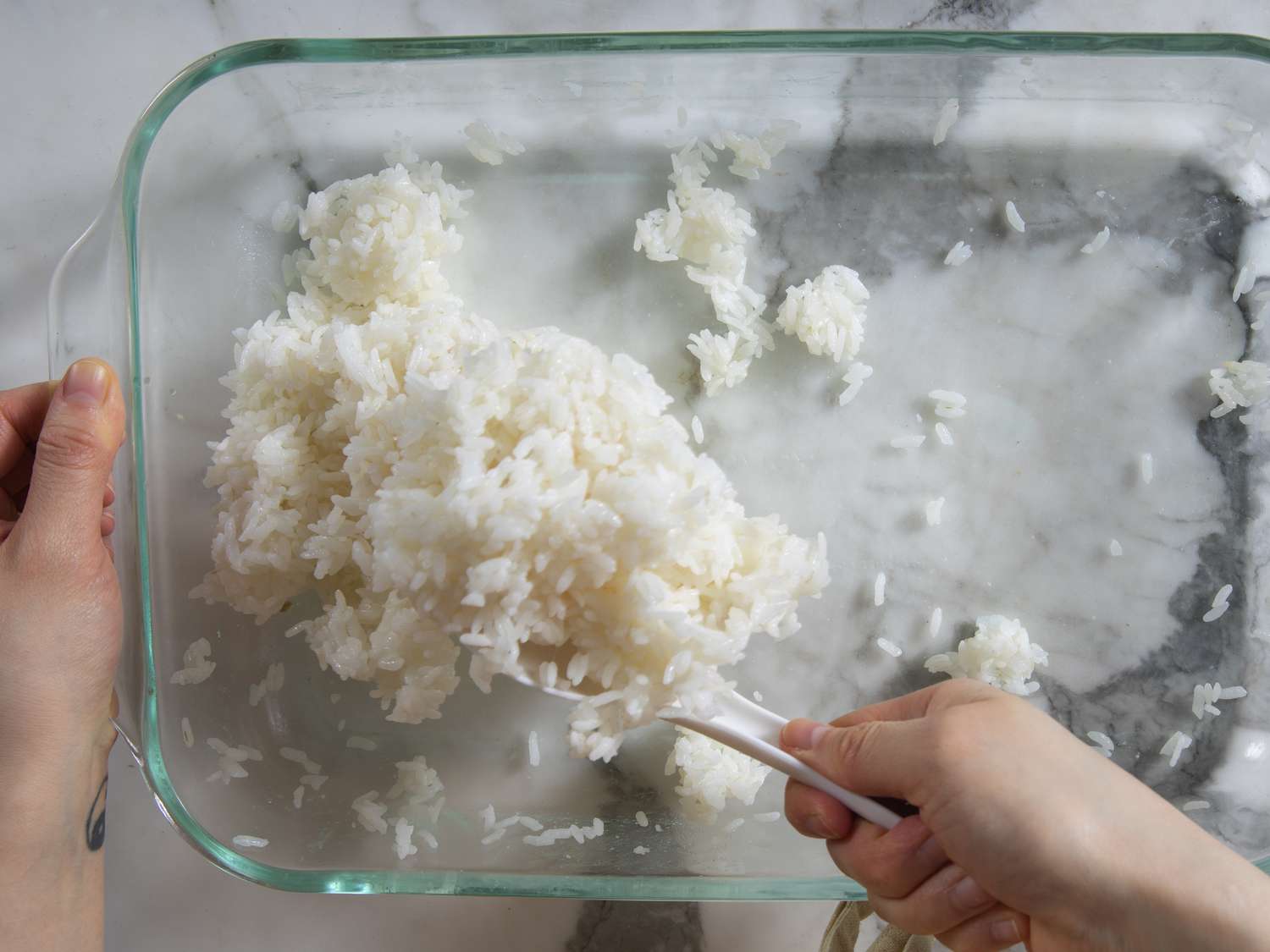 Overhead view of flipping rice