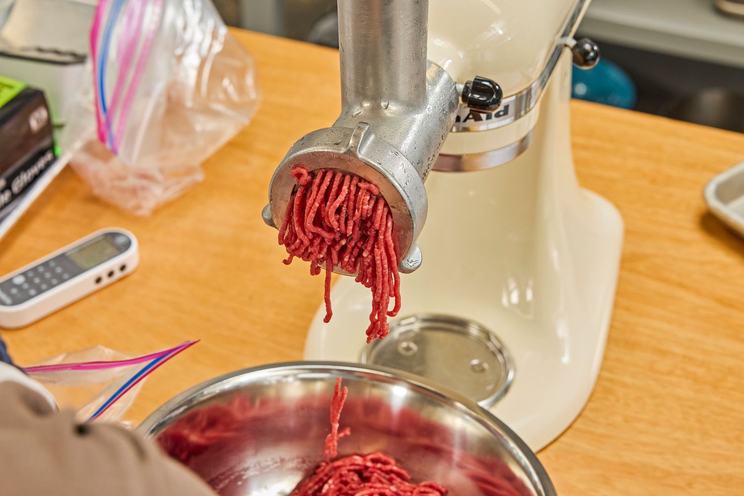 Close-up of grind meat from KitchenAid KSMMGA Metal Food Grinder Attachment