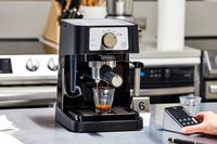The De'Longhi Stilosa Espresso Machine brewing an espresso