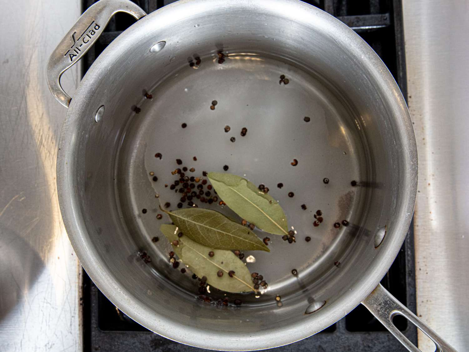Overhead view of brining mixture in pot