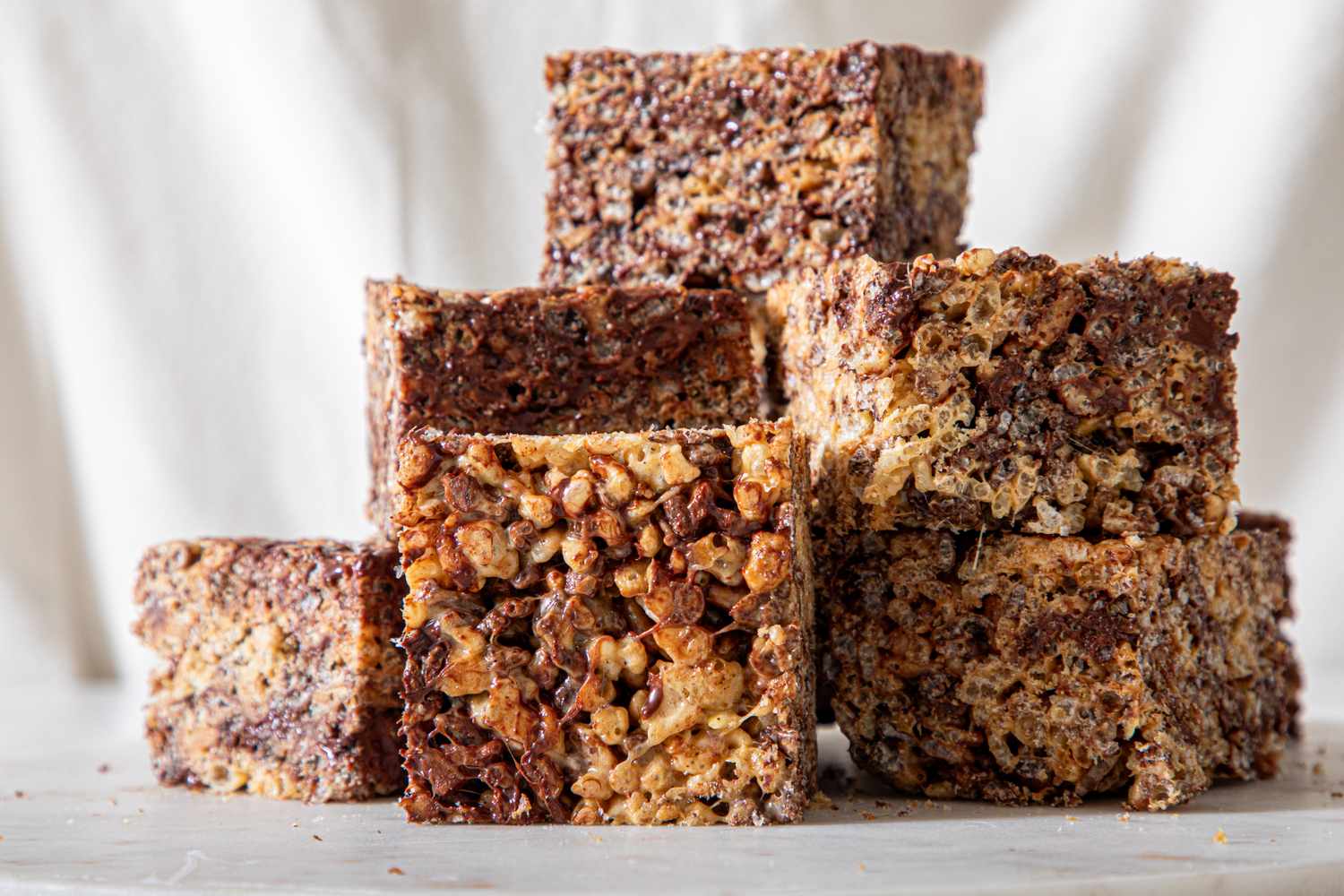 Stack of malted rice krispies displayed on a surface