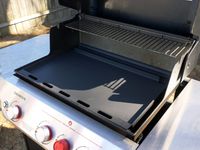 weber griddle insert in a weber grill