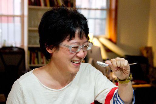 Robyn Lee tasting ice cream.