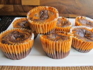 Pumpkin Swirl Brownies arranged on a white platter.