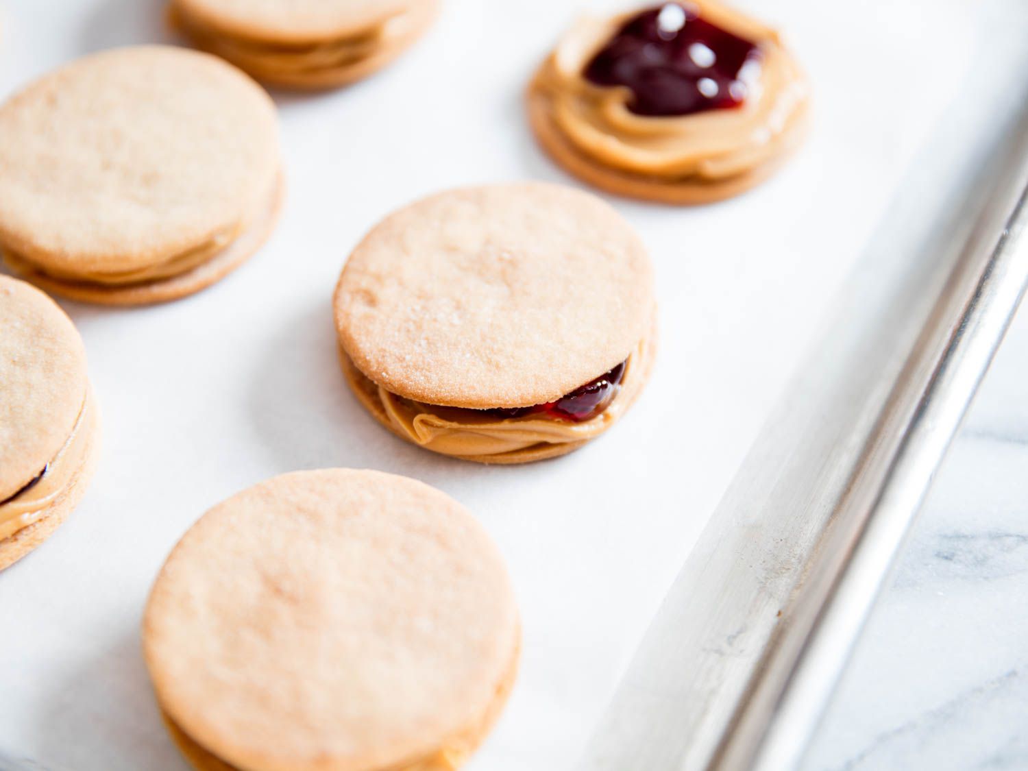 Another cookie is placed on top of the filling.