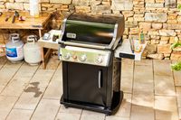 The Weber Spirit EX-325s Smart Grill outside on a patio