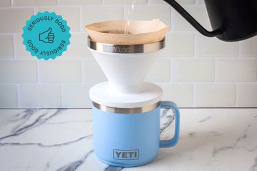 Water being poured from a gooseneck kettle the Yeti pour-over.