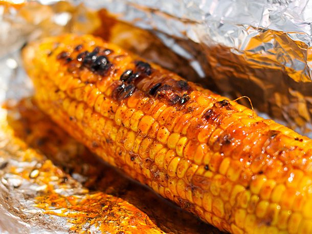 The finished corn, unwrapped and slathered in chile lime butter.