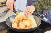 A crepe made in the Vollrath 12.5 Inch French Style Carbon Steel Fry Pan