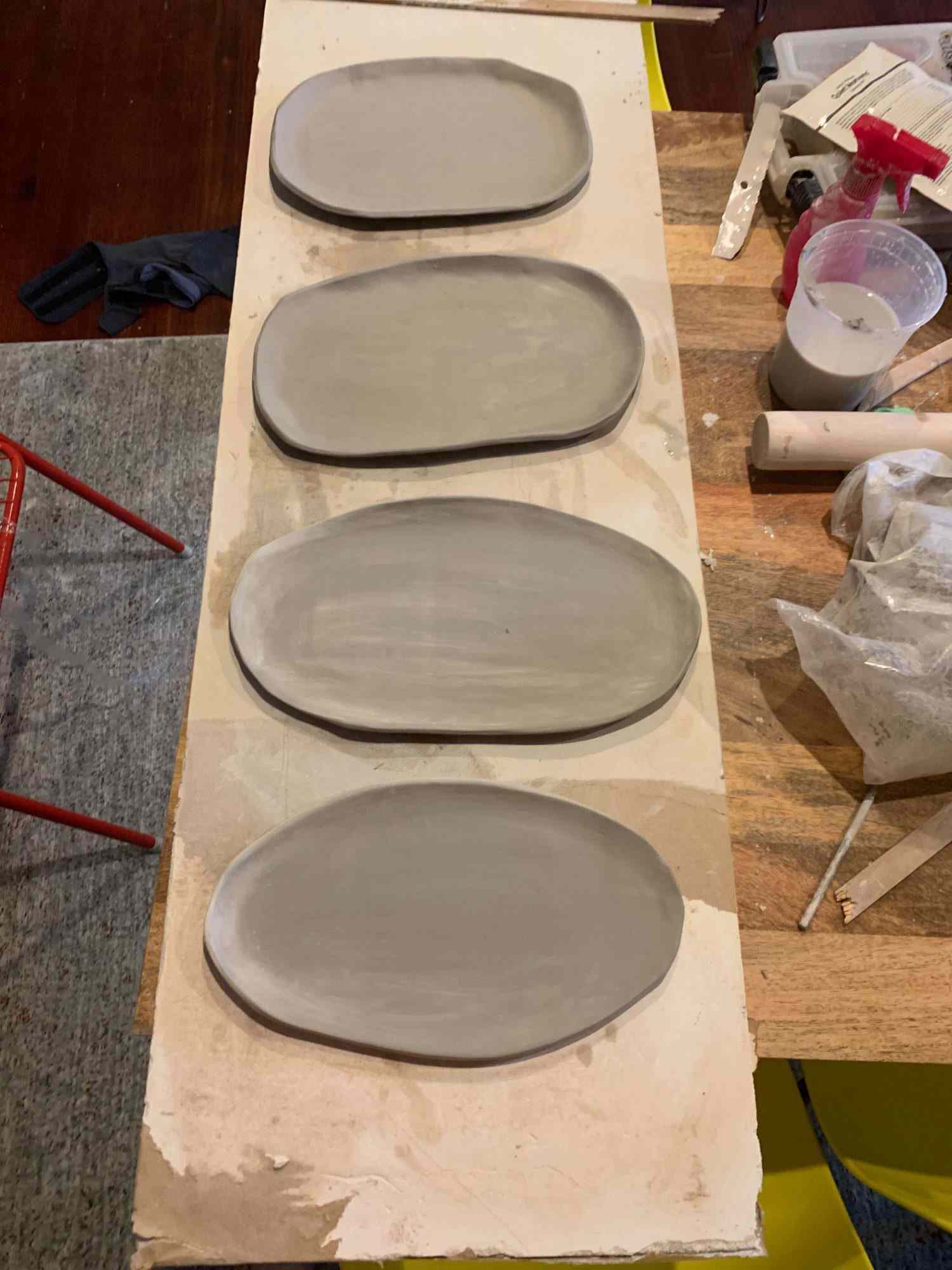 Line of thrown plates drying