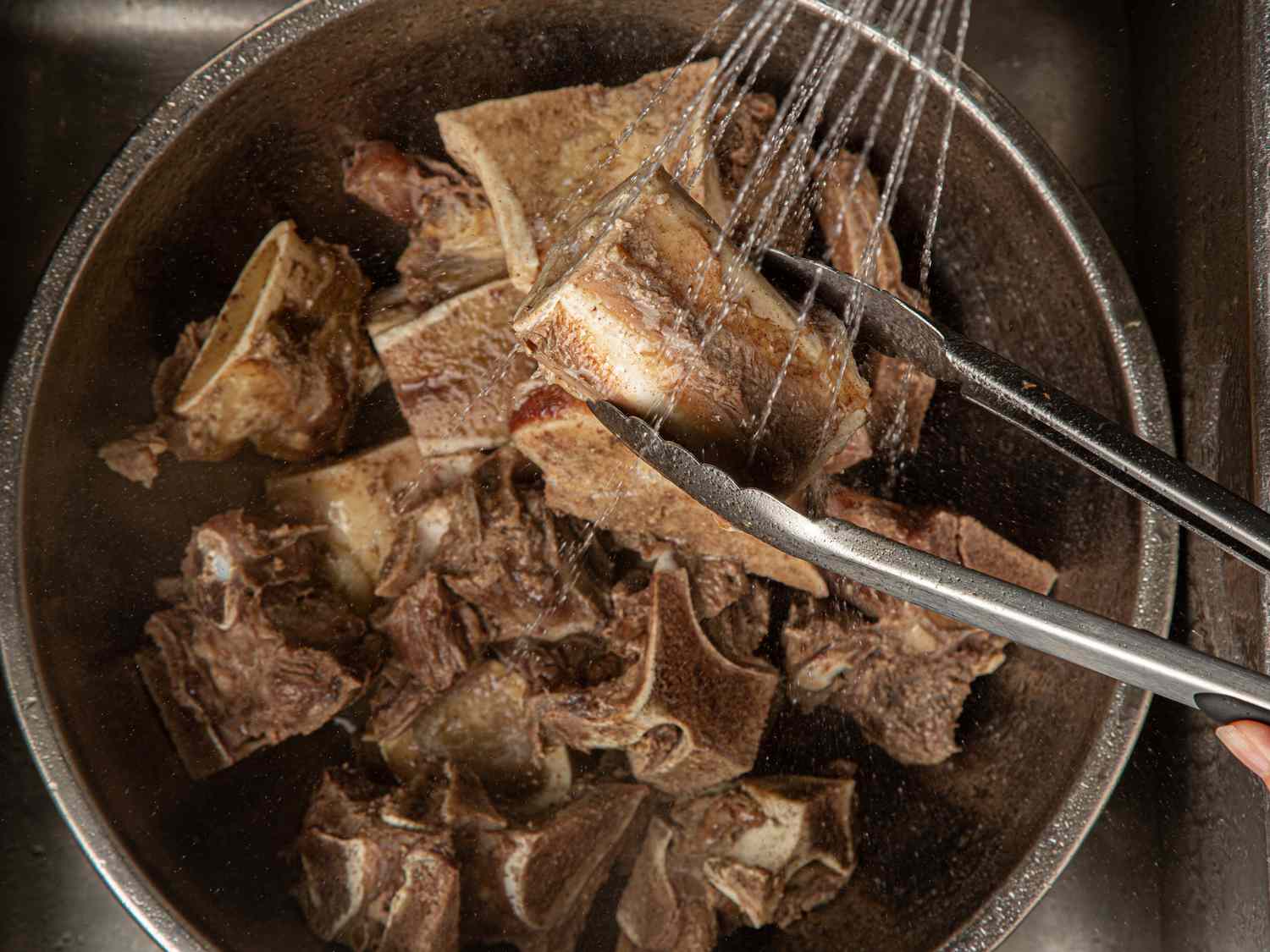 Overhead view of rinsing bones