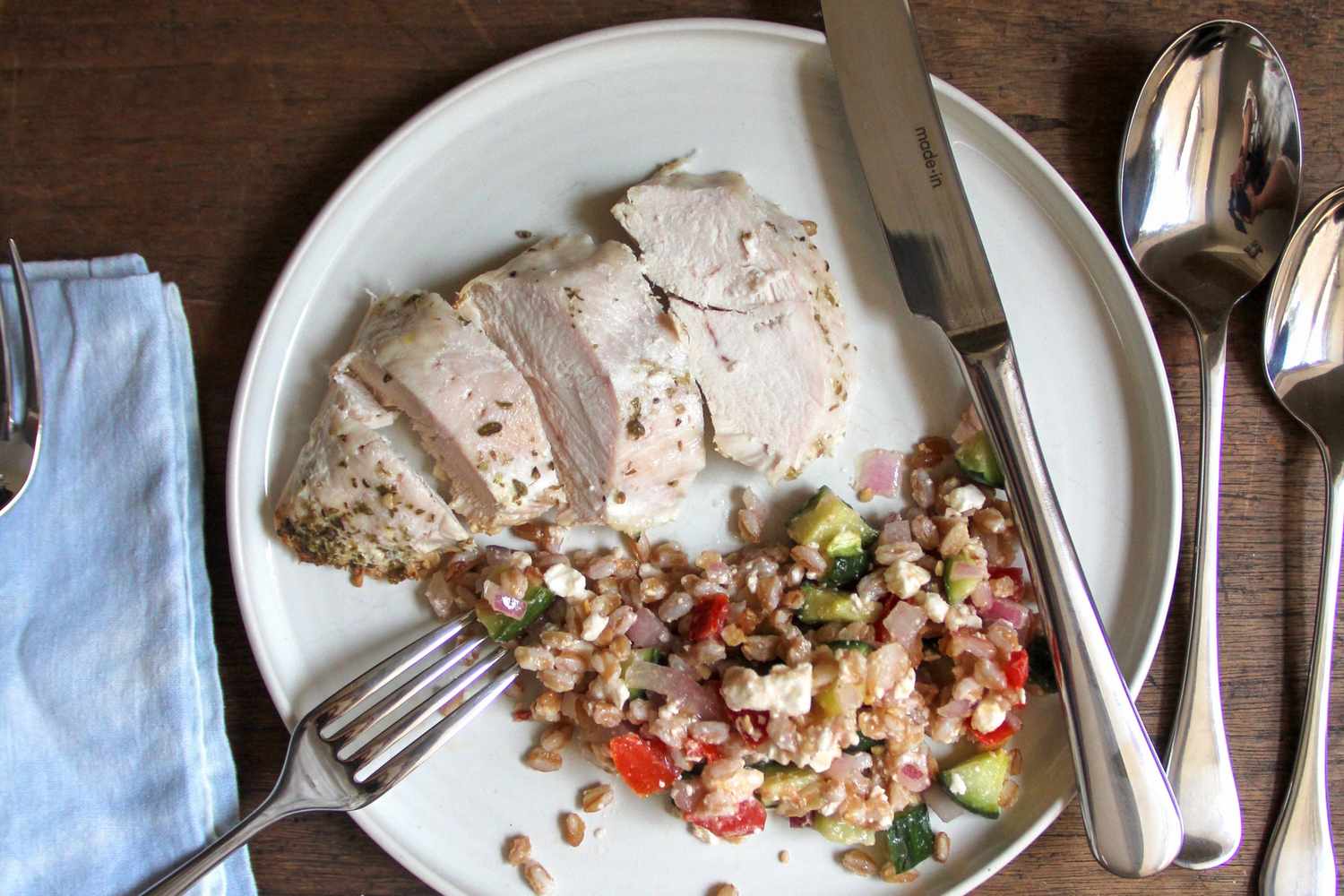 Made In Flatware next to a plate of food