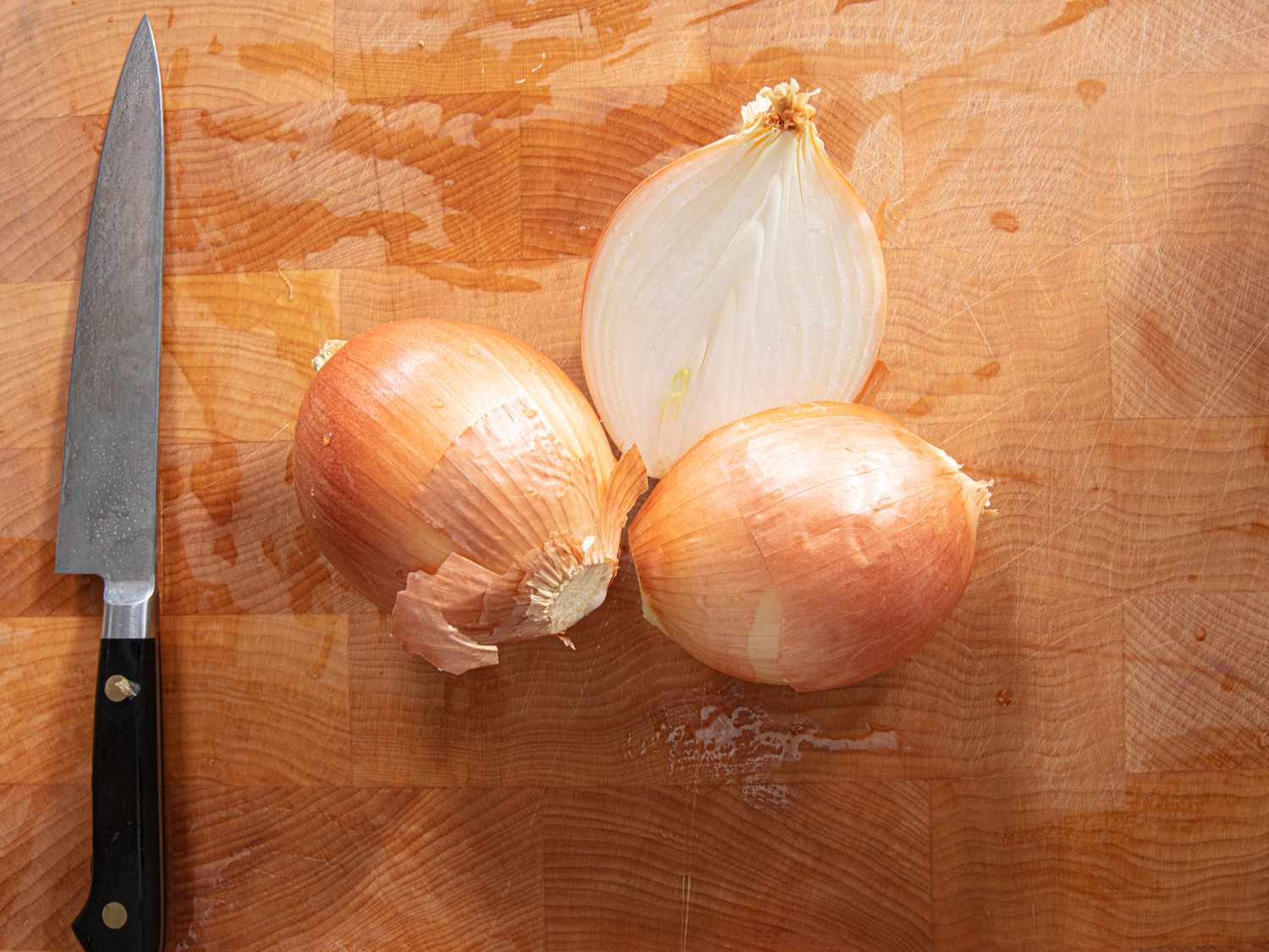 Overhead view of cutting an onion