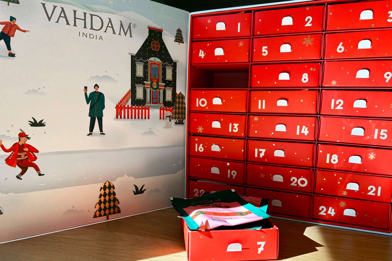 The Vahdam tea Advent calendar propped open on a table