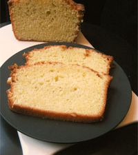 Slices of EVO and yogurt cake, served on a black plate.