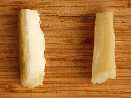 Side-by-side examples of boiled yuca showing one more unevenly cooked than the other
