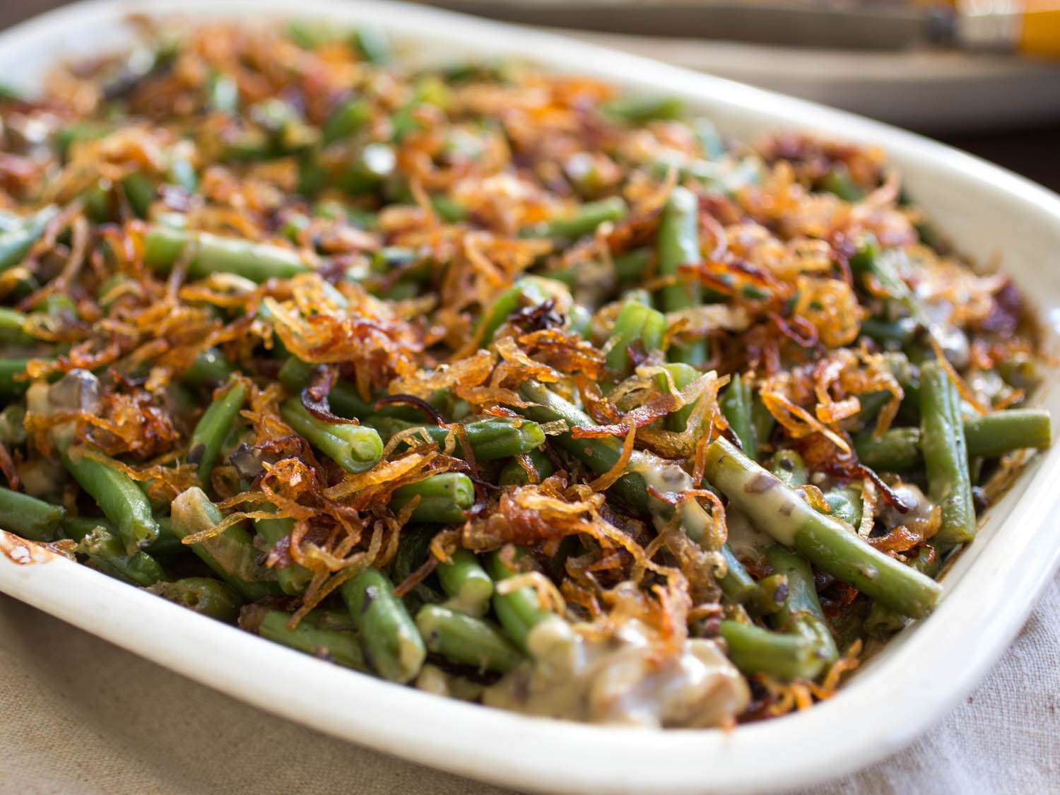 A green bean casserole in a casserole dish
