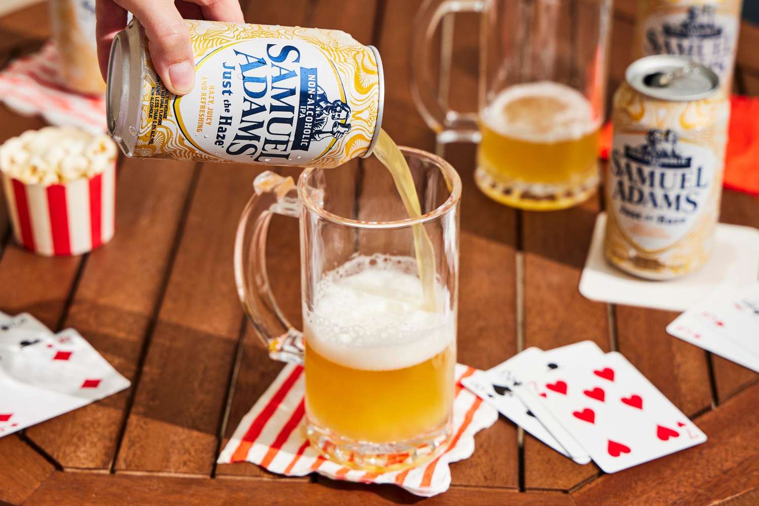 sam adams just the haze being poured into a glass 