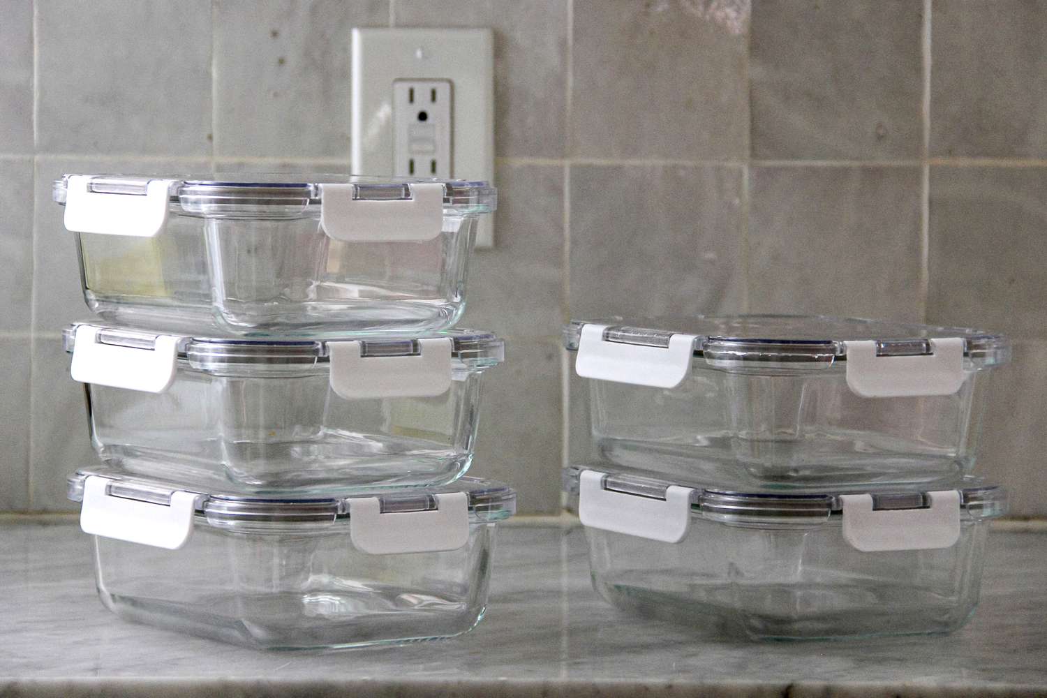 Hold Everything Rectangular Glass Food Storage Containers, 10-Piece Set with white snap lids on a countertop
