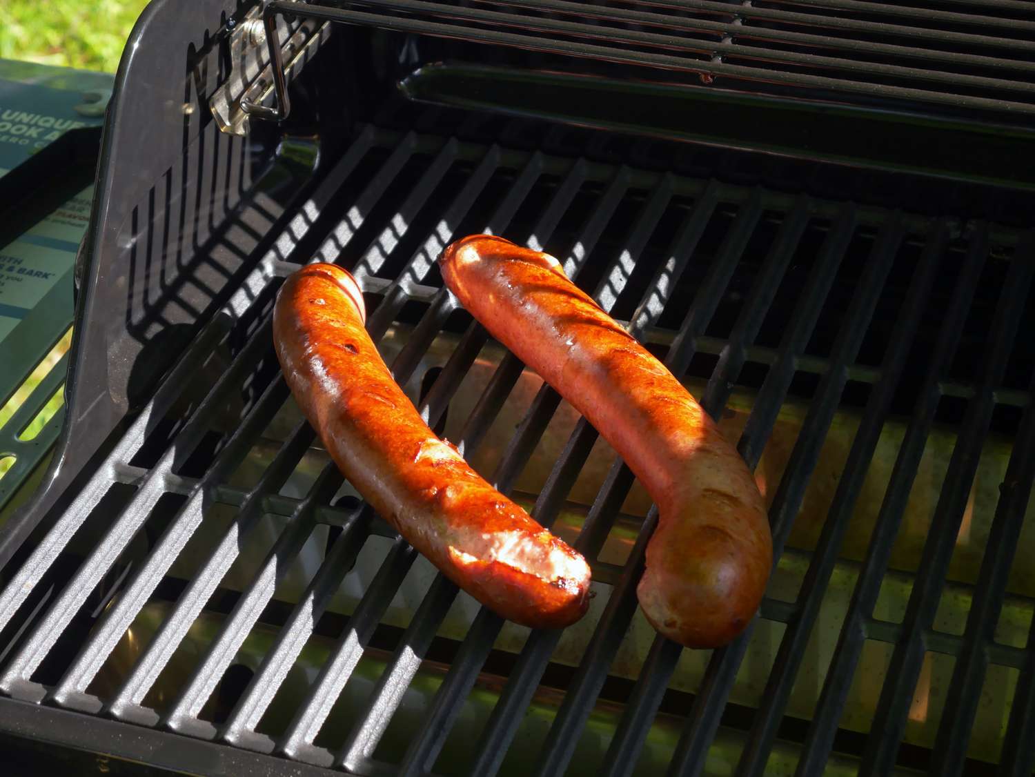 two sausages on a grill 