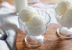 Scoops of homemade fior de latte gelato in small glass bowls.