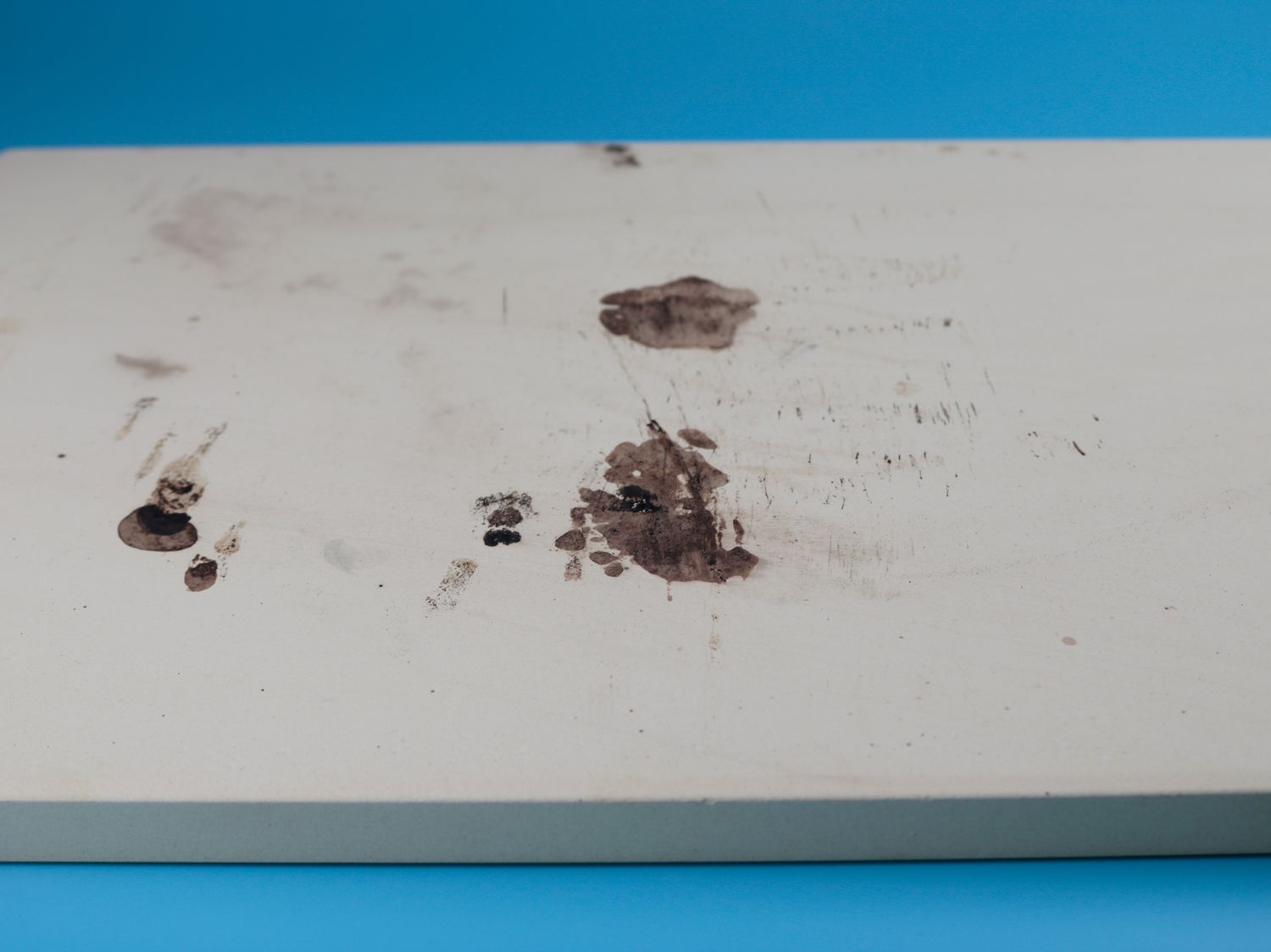 grease stains on a pizza stone