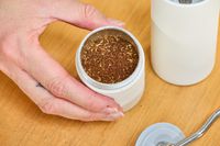 Coffee beans ground in the Timemore C2 Max Manual Grinder