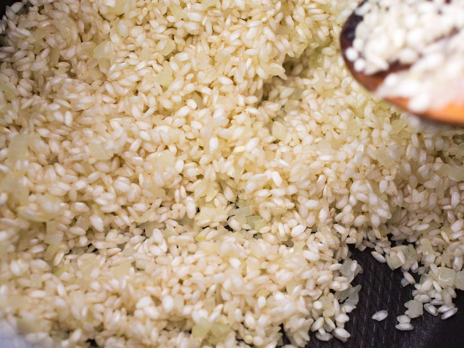 Rice toasting in a pressure cooker. 