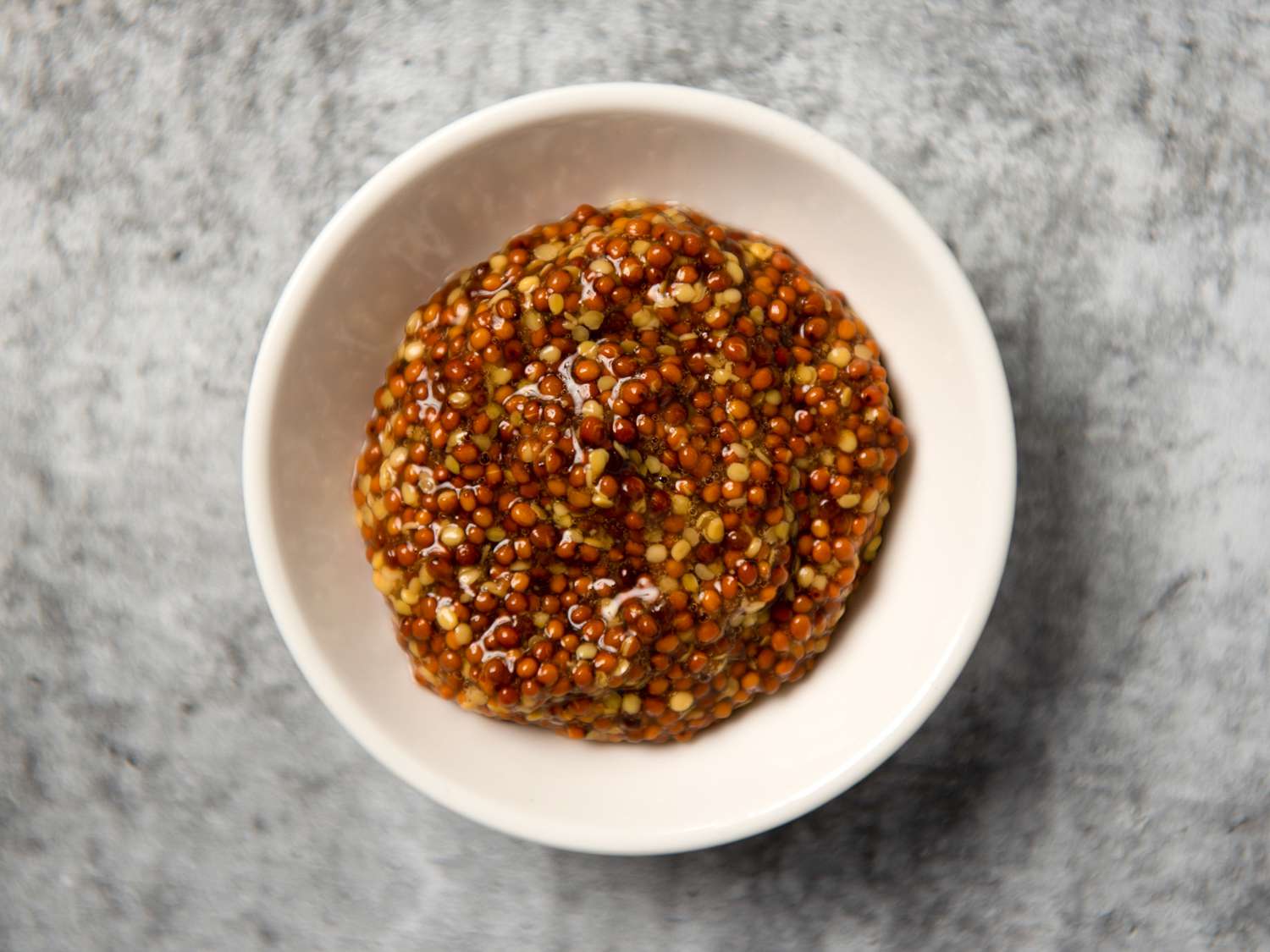 whole grain mustard in a small white bowl