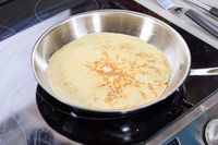 A crepe made in the All-Clad D3 Stainless-Steel 12-Inch Fry Pan