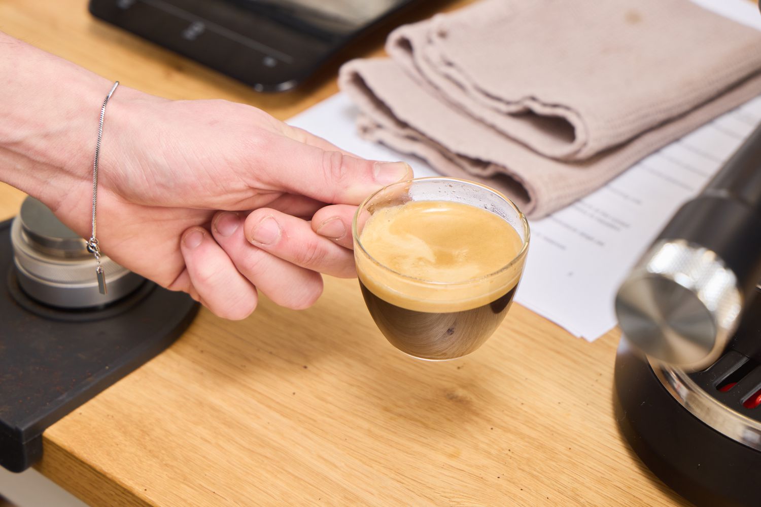 A shot of espresso made using the De'Longhi EC900M Dedica Maestro Espresso Machine