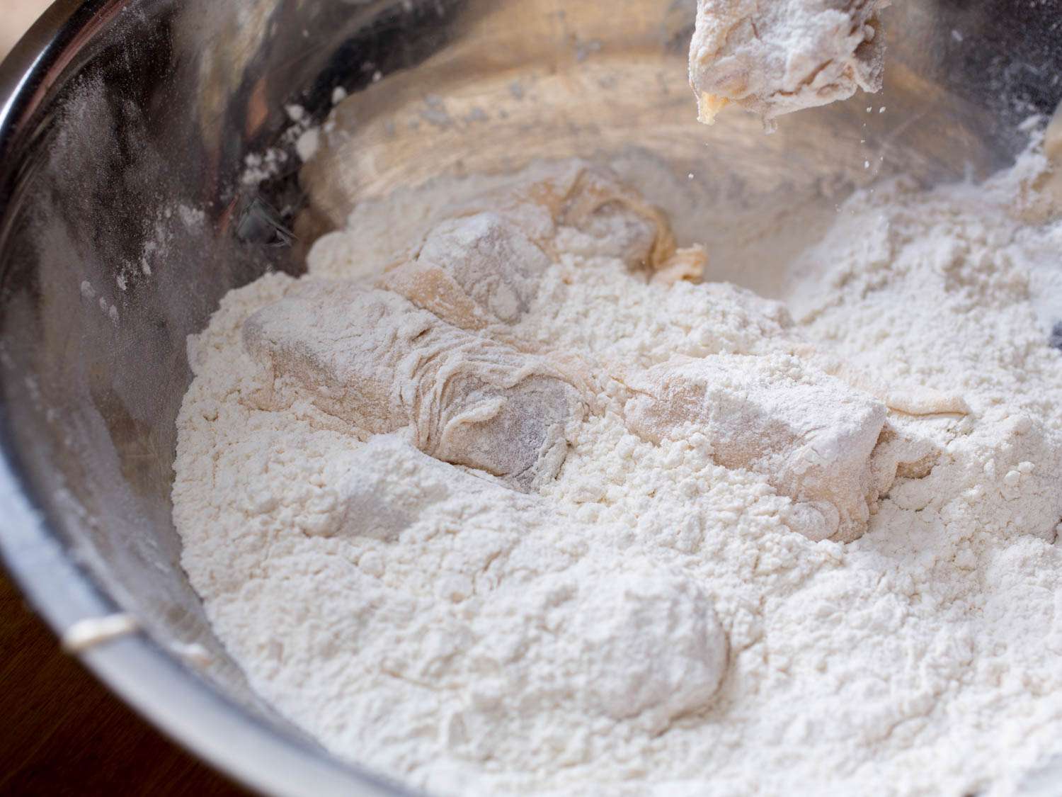 Battered fish in second coating of flour