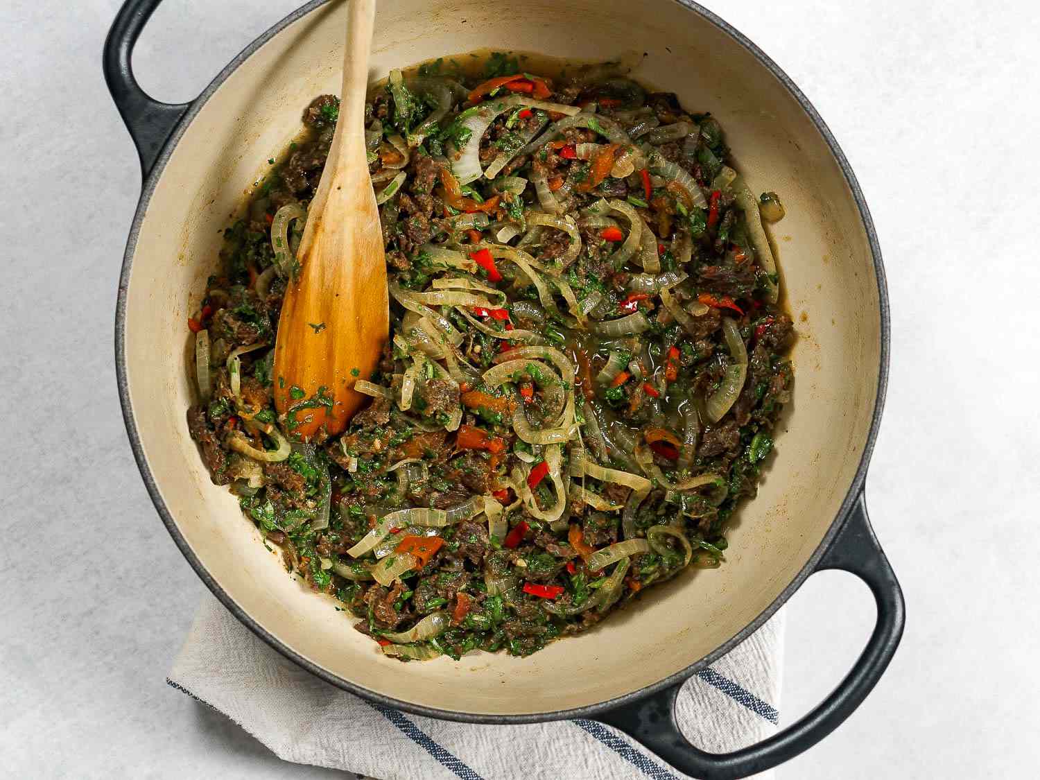 Overhead image of a dried beef stew called machaca guisada.