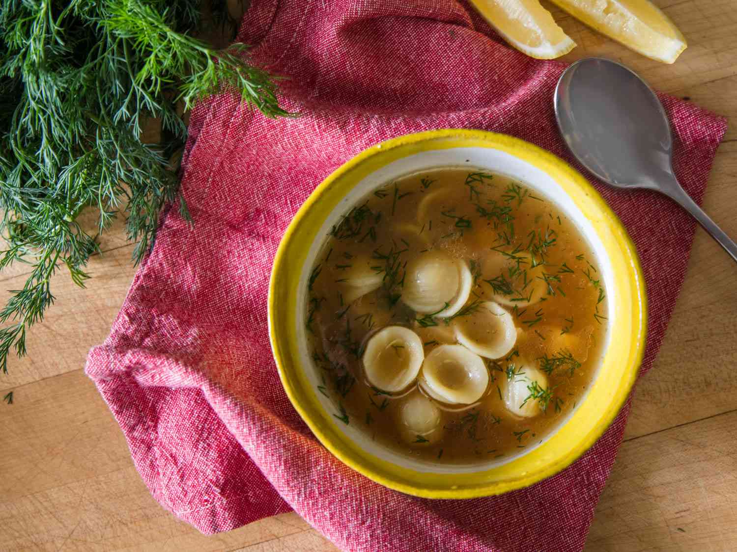 Overhead view of a bowl containing the ultimate chicken soup.