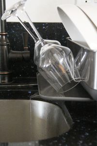 Close-up of wine glasses on the Simplehuman Standard Steel Frame Dish Rack