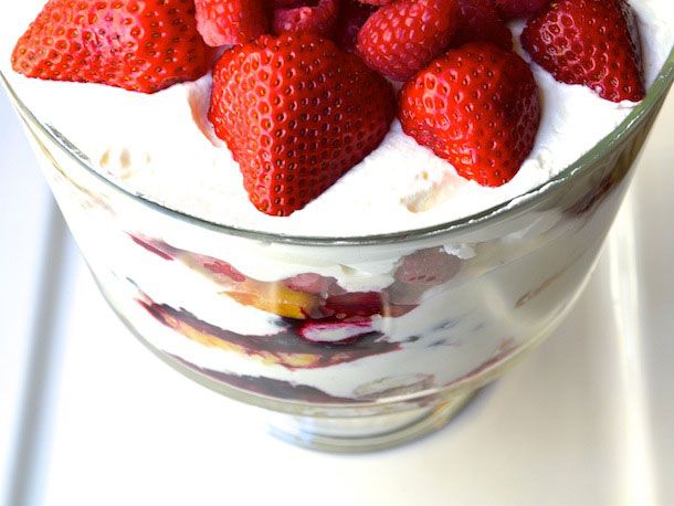 A serving dish of strawberry trifle. 