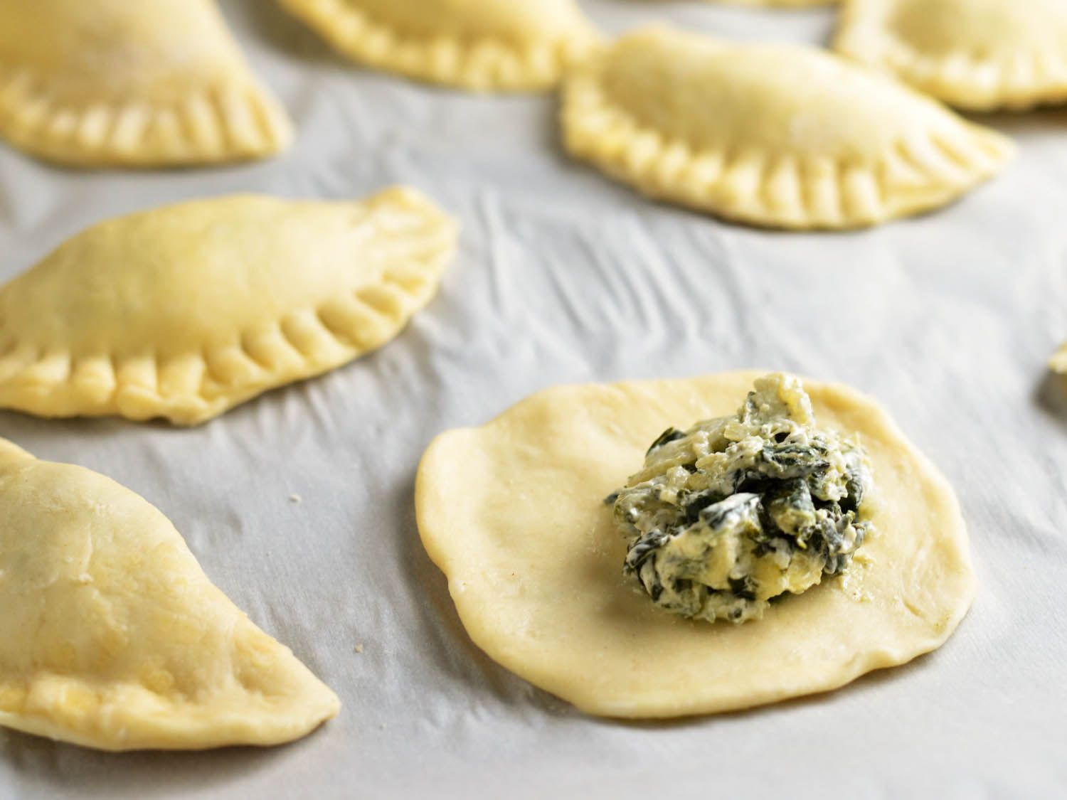 20150309-spinach-artichoke-dip-pierogi-folding-morgan-eisenberg.jpg