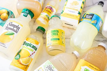 Assorted bottles and cartons of lemonade displayed on a surface