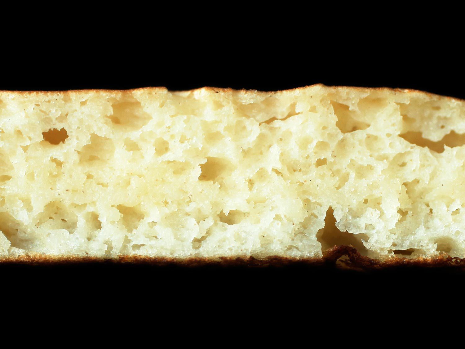 A closeup cross-section of a fluffy cooked pancake
