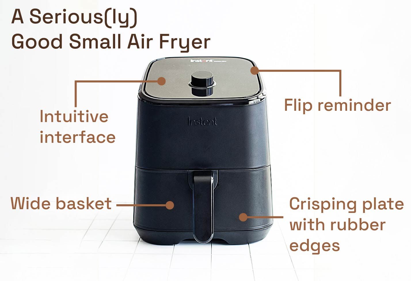an air fryer on a white surface
